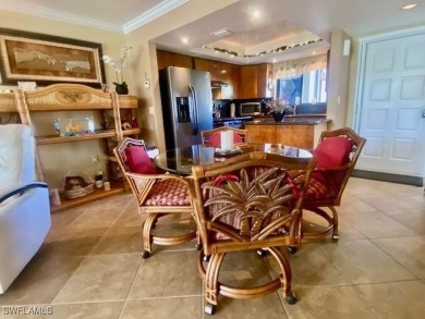 Inviting tropical oasis meets updated first floor convenience on The Landings Yacht, Golf and Tennis Club in Florida - for sale on GolfHomes.com, golf home, golf lot