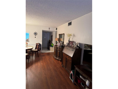 Beautiful and spacious 2BR/2BA condo in the prestigious 55+ on Sunrise Lakes Phase III in Florida - for sale on GolfHomes.com, golf home, golf lot