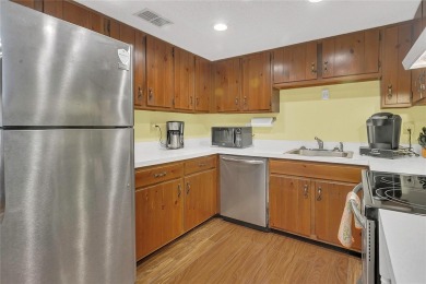 This charming 2 bed / 2 full bath condo is nestled in a quiet on Country Club At Silver Springs Shores in Florida - for sale on GolfHomes.com, golf home, golf lot