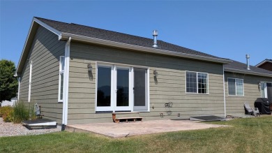 Offered is a 3-bedroom, 3-bathroom townhome with 2,592 square on Village Greens Golf Club in Montana - for sale on GolfHomes.com, golf home, golf lot