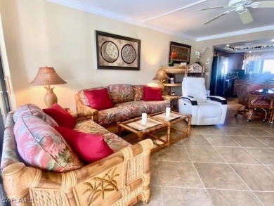 Inviting tropical oasis meets updated first floor convenience on The Landings Yacht, Golf and Tennis Club in Florida - for sale on GolfHomes.com, golf home, golf lot