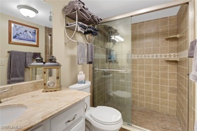 Inviting tropical oasis meets updated first floor convenience on The Landings Yacht, Golf and Tennis Club in Florida - for sale on GolfHomes.com, golf home, golf lot