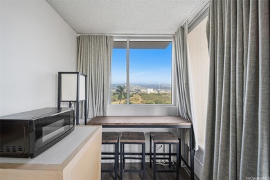 Cozy corner end unit that has been beautifully updated with on Ala Wai Golf Course in Hawaii - for sale on GolfHomes.com, golf home, golf lot