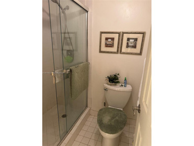 Beautiful and spacious 2BR/2BA condo in the prestigious 55+ on Sunrise Lakes Phase III in Florida - for sale on GolfHomes.com, golf home, golf lot