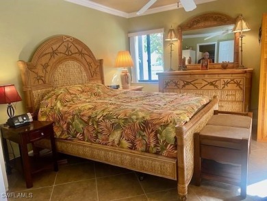 Inviting tropical oasis meets updated first floor convenience on The Landings Yacht, Golf and Tennis Club in Florida - for sale on GolfHomes.com, golf home, golf lot