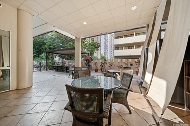 Cozy corner end unit that has been beautifully updated with on Ala Wai Golf Course in Hawaii - for sale on GolfHomes.com, golf home, golf lot