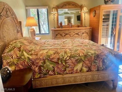 Inviting tropical oasis meets updated first floor convenience on The Landings Yacht, Golf and Tennis Club in Florida - for sale on GolfHomes.com, golf home, golf lot