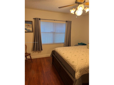 Beautiful and spacious 2BR/2BA condo in the prestigious 55+ on Sunrise Lakes Phase III in Florida - for sale on GolfHomes.com, golf home, golf lot