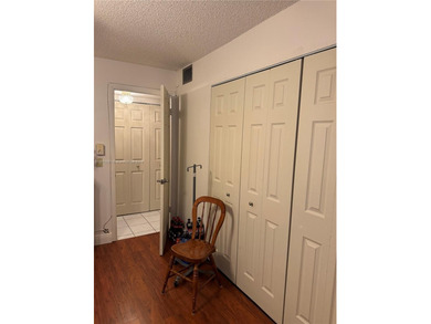Beautiful and spacious 2BR/2BA condo in the prestigious 55+ on Sunrise Lakes Phase III in Florida - for sale on GolfHomes.com, golf home, golf lot