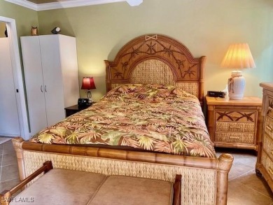 Inviting tropical oasis meets updated first floor convenience on The Landings Yacht, Golf and Tennis Club in Florida - for sale on GolfHomes.com, golf home, golf lot