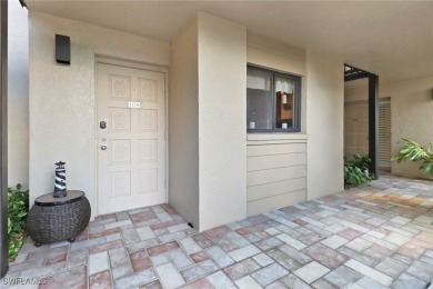 Inviting tropical oasis meets updated first floor convenience on The Landings Yacht, Golf and Tennis Club in Florida - for sale on GolfHomes.com, golf home, golf lot