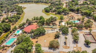 This charming 2 bed / 2 full bath condo is nestled in a quiet on Country Club At Silver Springs Shores in Florida - for sale on GolfHomes.com, golf home, golf lot