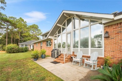 Open and airy Lake Forest golf course home with fortified roof! on Lake Forest Yacht and Country Club in Alabama - for sale on GolfHomes.com, golf home, golf lot
