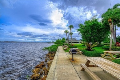 Inviting tropical oasis meets updated first floor convenience on The Landings Yacht, Golf and Tennis Club in Florida - for sale on GolfHomes.com, golf home, golf lot