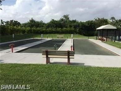 Inviting tropical oasis meets updated first floor convenience on The Landings Yacht, Golf and Tennis Club in Florida - for sale on GolfHomes.com, golf home, golf lot
