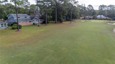 Open and airy Lake Forest golf course home with fortified roof! on Lake Forest Yacht and Country Club in Alabama - for sale on GolfHomes.com, golf home, golf lot