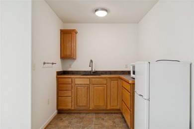 Offered is a 3-bedroom, 3-bathroom townhome with 2,592 square on Village Greens Golf Club in Montana - for sale on GolfHomes.com, golf home, golf lot