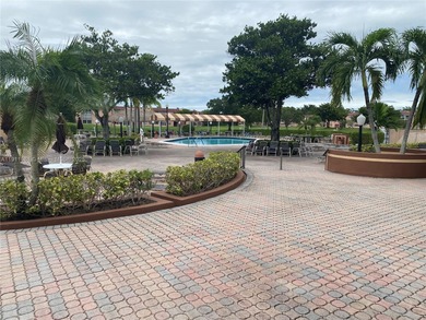 Beautiful and spacious 2BR/2BA condo in the prestigious 55+ on Sunrise Lakes Phase III in Florida - for sale on GolfHomes.com, golf home, golf lot