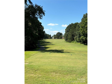 Explore this 4-bedroom, 3.5-bathroom home nestled alongside a on Catawba Springs Golf Course At Lake Hickory  in North Carolina - for sale on GolfHomes.com, golf home, golf lot