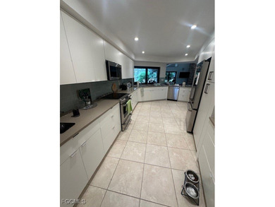 Experience refined living in this beautifully appointed on Fiddlesticks Country Club in Florida - for sale on GolfHomes.com, golf home, golf lot