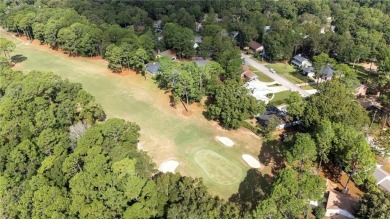 Open and airy Lake Forest golf course home with fortified roof! on Lake Forest Yacht and Country Club in Alabama - for sale on GolfHomes.com, golf home, golf lot