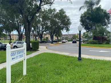 Beautiful and spacious 2BR/2BA condo in the prestigious 55+ on Sunrise Lakes Phase III in Florida - for sale on GolfHomes.com, golf home, golf lot