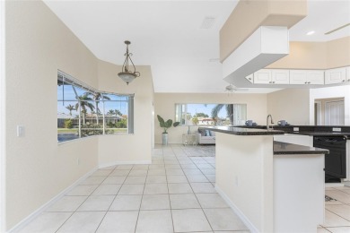 Stunning WATERFRONT home is located on an oversized lot in a on Saint Andrews South Golf Club in Florida - for sale on GolfHomes.com, golf home, golf lot