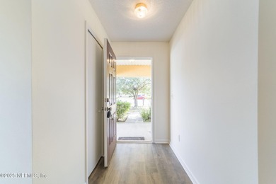 This updated 2-bedroom, 2-bath single-family home in St. Johns on King and Bear Golf Course/World Golf Village in Florida - for sale on GolfHomes.com, golf home, golf lot