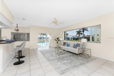 Stunning WATERFRONT home is located on an oversized lot in a on Saint Andrews South Golf Club in Florida - for sale on GolfHomes.com, golf home, golf lot