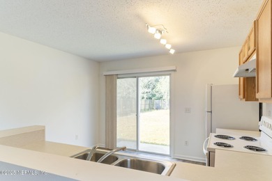 This updated 2-bedroom, 2-bath single-family home in St. Johns on King and Bear Golf Course/World Golf Village in Florida - for sale on GolfHomes.com, golf home, golf lot