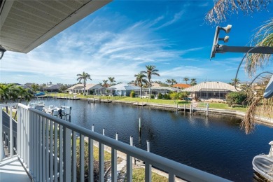 Stunning WATERFRONT home is located on an oversized lot in a on Saint Andrews South Golf Club in Florida - for sale on GolfHomes.com, golf home, golf lot