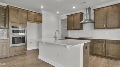 Welcome to 2209 Warbler Drive at Horton Park, located in Apex on Knights Play Golf Center in North Carolina - for sale on GolfHomes.com, golf home, golf lot