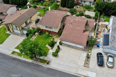 This beautiful, move-in ready home is nestled on a quiet on La Mirada Golf Course in California - for sale on GolfHomes.com, golf home, golf lot