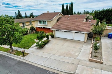 This beautiful, move-in ready home is nestled on a quiet on La Mirada Golf Course in California - for sale on GolfHomes.com, golf home, golf lot