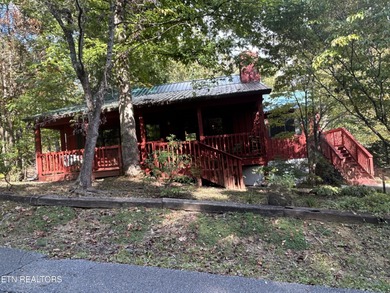 Discover your perfect escape in the heart of Townsend, Tennessee on Laurel Valley Golf Course in Tennessee - for sale on GolfHomes.com, golf home, golf lot