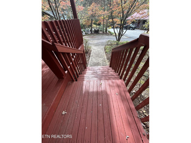 Discover your perfect escape in the heart of Townsend, Tennessee on Laurel Valley Golf Course in Tennessee - for sale on GolfHomes.com, golf home, golf lot