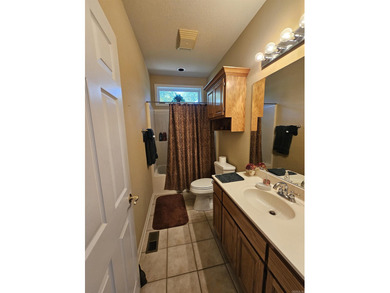 Move-in ready and priced to sell at $395,000, this 2,649 sq. ft on  in Arkansas - for sale on GolfHomes.com, golf home, golf lot