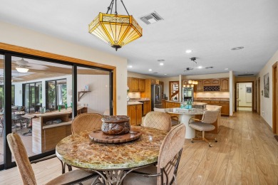 Step into country club living at its finest in this expansive on Pipers Landing Country Club in Florida - for sale on GolfHomes.com, golf home, golf lot