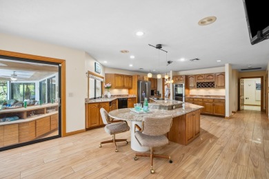 Step into country club living at its finest in this expansive on Pipers Landing Country Club in Florida - for sale on GolfHomes.com, golf home, golf lot