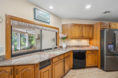 Step into country club living at its finest in this expansive on Pipers Landing Country Club in Florida - for sale on GolfHomes.com, golf home, golf lot