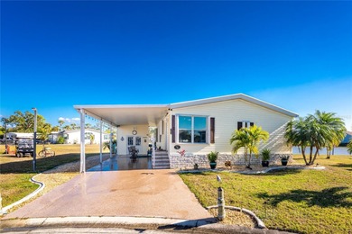Beautifully Finished Waterfront Home featuring 2 bedrooms and 2 on Kings Gate Golf Club in Florida - for sale on GolfHomes.com, golf home, golf lot
