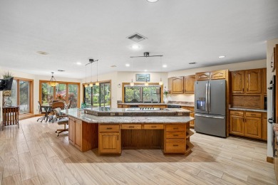 Step into country club living at its finest in this expansive on Pipers Landing Country Club in Florida - for sale on GolfHomes.com, golf home, golf lot