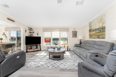 Beautifully Finished Waterfront Home featuring 2 bedrooms and 2 on Kings Gate Golf Club in Florida - for sale on GolfHomes.com, golf home, golf lot