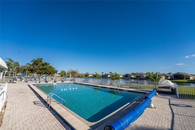 Beautifully Finished Waterfront Home featuring 2 bedrooms and 2 on Kings Gate Golf Club in Florida - for sale on GolfHomes.com, golf home, golf lot