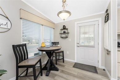 Beautifully Finished Waterfront Home featuring 2 bedrooms and 2 on Kings Gate Golf Club in Florida - for sale on GolfHomes.com, golf home, golf lot