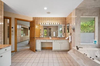 Step into country club living at its finest in this expansive on Pipers Landing Country Club in Florida - for sale on GolfHomes.com, golf home, golf lot