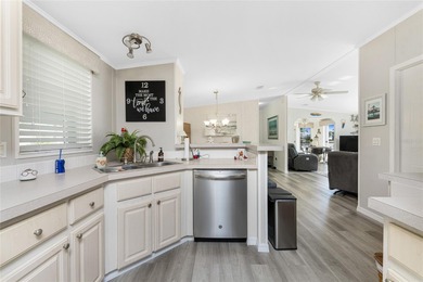 Beautifully Finished Waterfront Home featuring 2 bedrooms and 2 on Kings Gate Golf Club in Florida - for sale on GolfHomes.com, golf home, golf lot
