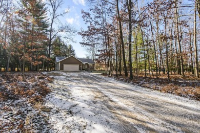 Prepare to fall in love with this captivating 5-bedroom on Canadian Lakes Country Club-The Royal Course in Michigan - for sale on GolfHomes.com, golf home, golf lot