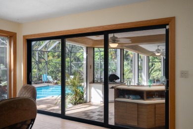 Step into country club living at its finest in this expansive on Pipers Landing Country Club in Florida - for sale on GolfHomes.com, golf home, golf lot