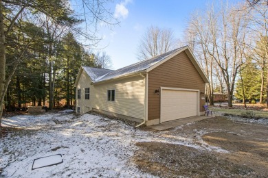 Prepare to fall in love with this captivating 5-bedroom on Canadian Lakes Country Club-The Royal Course in Michigan - for sale on GolfHomes.com, golf home, golf lot